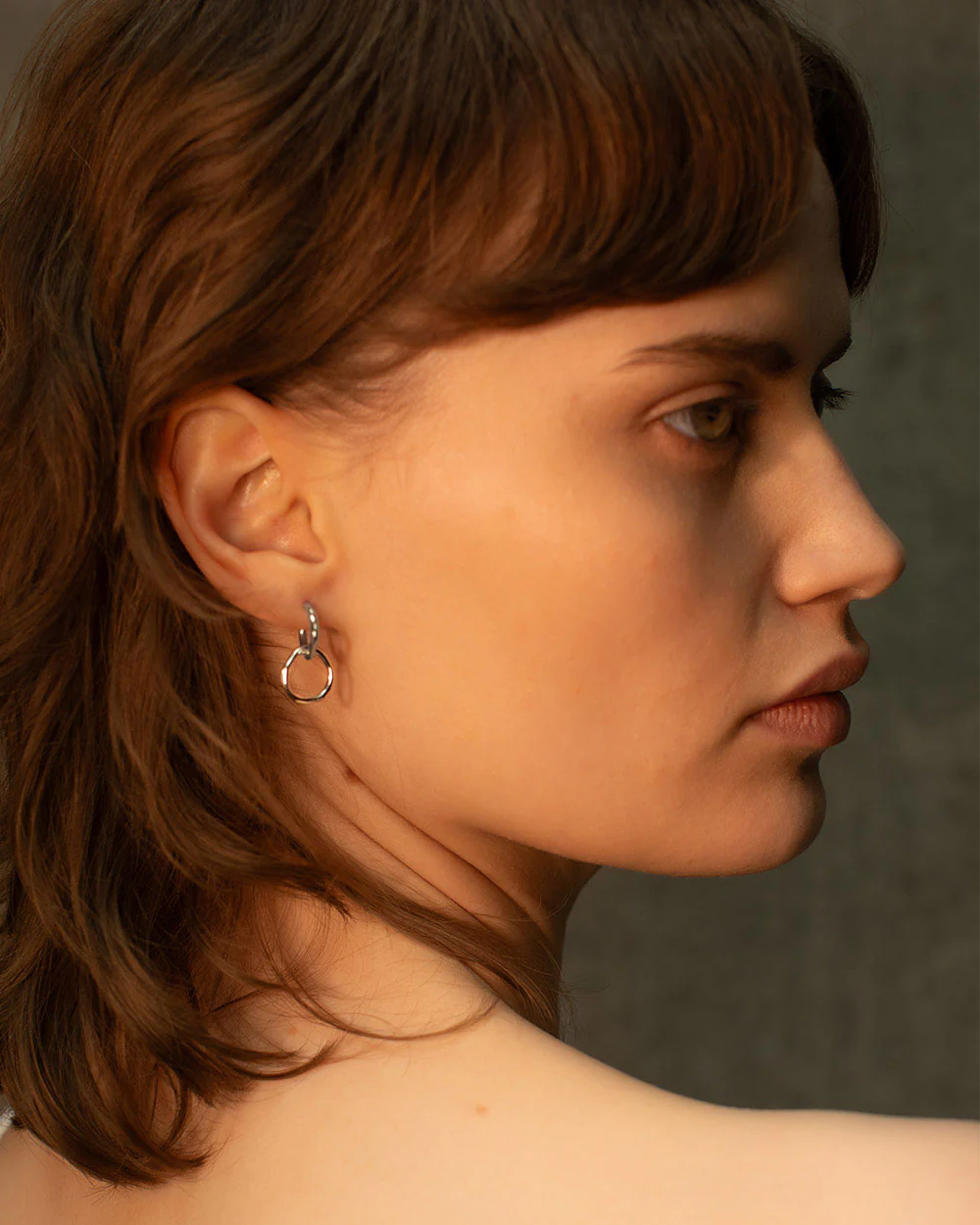 Interlinked Huggie Hoop Earrings - Image 3